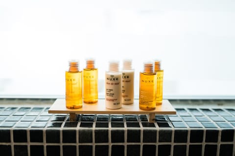 Standard Suite, Hot Tub, Sea View | Bathroom | Shower, slippers, towels