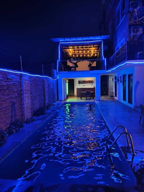Outdoor pool, pool umbrellas, sun loungers