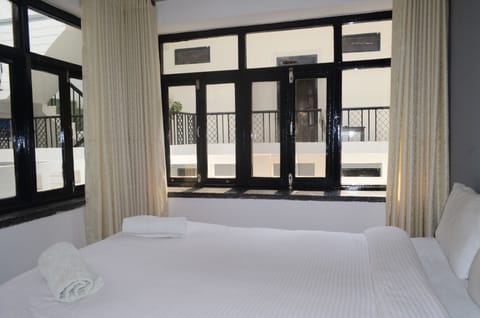 Budget Double Room | Individually decorated, individually furnished, desk, rollaway beds