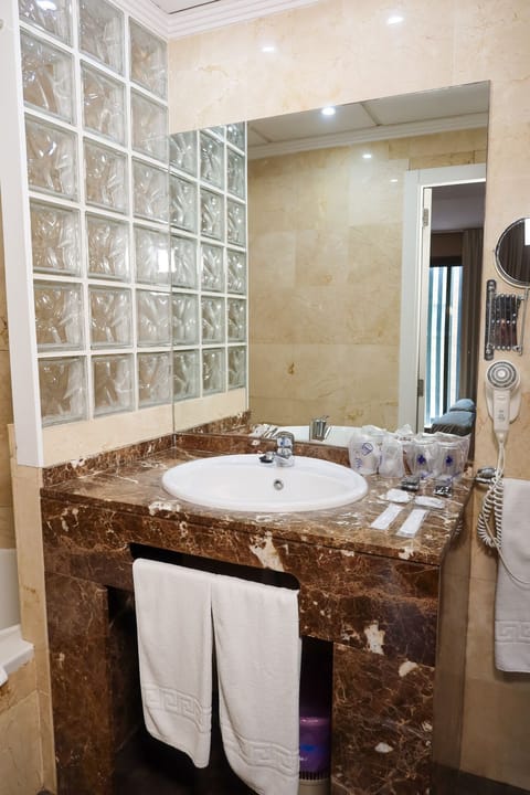 Triple Room | Bathroom | Hair dryer, slippers, bidet, towels