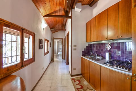 Apartment, 2 Bedrooms | Private kitchen | Full-size fridge, stovetop, coffee/tea maker, electric kettle