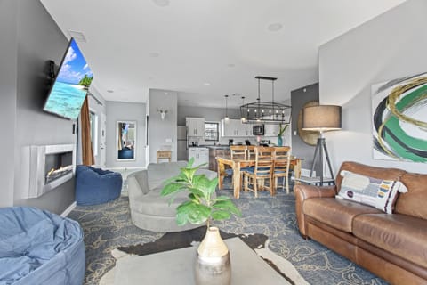 Exclusive Condo, 2 Bedrooms, Fireplace | Minibar, desk, laptop workspace, iron/ironing board