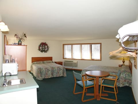 Room, 2 Queen Beds, Kitchenette | Desk, iron/ironing board, free WiFi, bed sheets