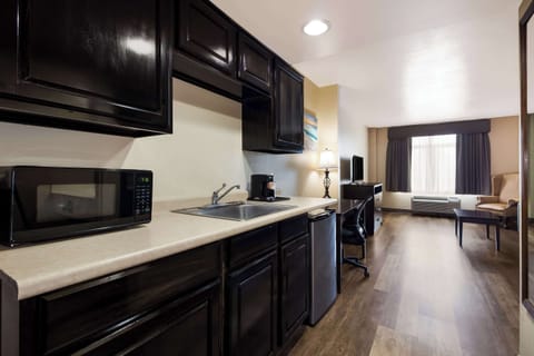 Suite, 2 Double Beds, Non Smoking | Desk, laptop workspace, iron/ironing board, free WiFi