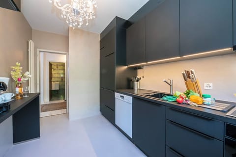 Family Apartment, 2 Bedrooms, 2 Bathrooms, Mountainside (Casa monti belvedere - Locarno Monti) | Private kitchen | Fridge, microwave, oven, stovetop