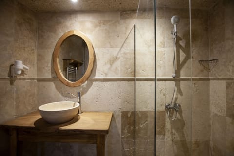 Shower, free toiletries, hair dryer, slippers