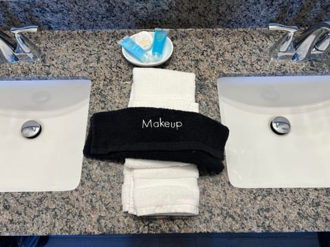 Combined shower/tub, hair dryer, towels, soap