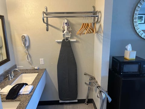 Combined shower/tub, hair dryer, towels, soap