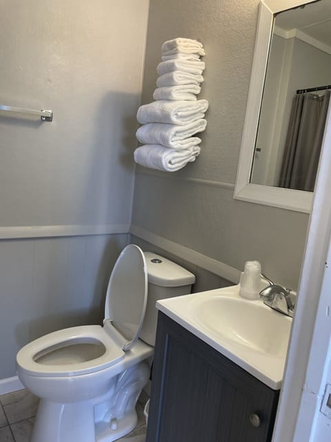 Double Room, Pool Access, Lake View | Bathroom | Combined shower/tub, towels, soap, shampoo