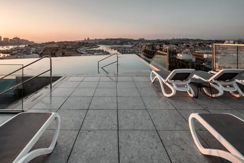 Indoor pool, seasonal outdoor pool, pool umbrellas