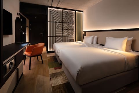 Premium bedding, down comforters, in-room safe, desk