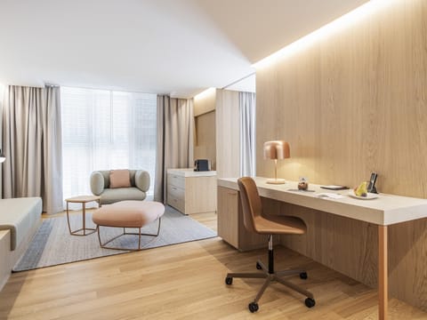 Suite, 1 King Bed, Balcony | Minibar, in-room safe, desk, rollaway beds