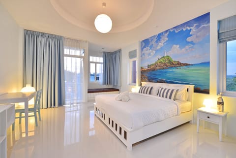 Deluxe Double Room | In-room safe, individually decorated, desk, blackout drapes