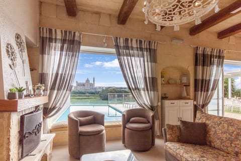 Family House, Multiple Bedrooms (Twilight Gozitan Farmhouse With Pool) | Living area | 21-inch flat-screen TV with cable channels