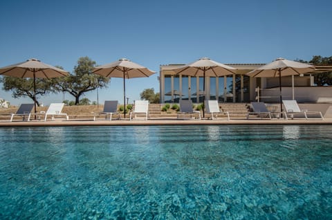 Outdoor pool, open 11:00 AM to 8:00 PM, pool umbrellas, sun loungers