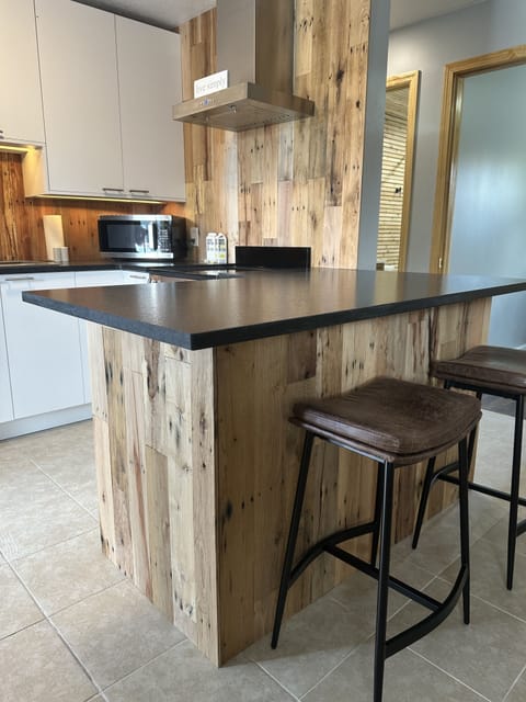 Grand Apartment | Private kitchen | Microwave, coffee/tea maker, eco-friendly cleaning products, freezer