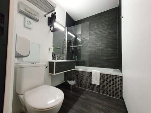 Eco-friendly toiletries, hair dryer, towels