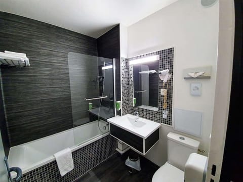 Eco-friendly toiletries, hair dryer, towels