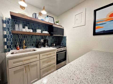 Family Suite | Private kitchen | Fridge, microwave, coffee/tea maker, freezer