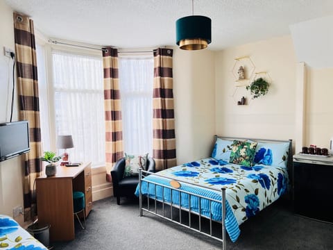 Basic Quadruple Room | Free WiFi, bed sheets