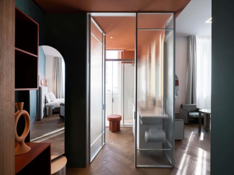 Premium bedding, down comforters, memory foam beds, minibar