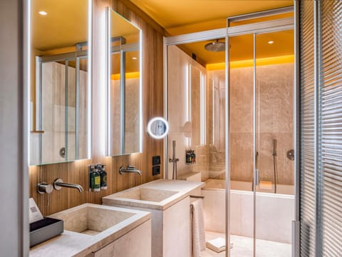 Premium bedding, down comforters, memory foam beds, minibar