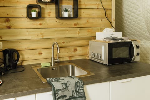 Deluxe Tent | Premium bedding, down comforters, individually decorated