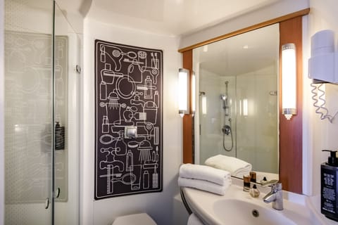 Shower, hydromassage showerhead, eco-friendly toiletries, hair dryer