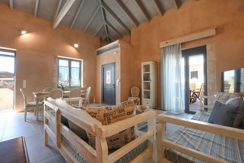 Luxury Room, 4 Bedrooms | Living area | Flat-screen TV