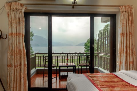 Standard Double or Twin Room (with Fan) | In-room safe, individually decorated, individually furnished, desk