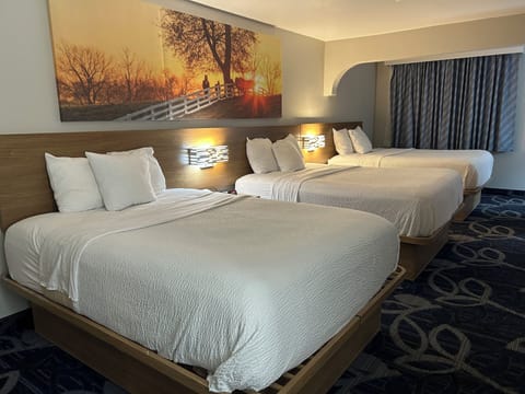 Suite, Multiple Beds (3 Queen Beds) | Desk, iron/ironing board, cribs/infant beds, rollaway beds