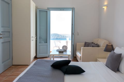 Junior Suite, Sea View (Outdoor Heated Jetted Tub) | 1 bedroom, in-room safe, individually decorated, individually furnished