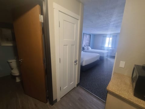 Standard Room, 1 King and 1 Queen | Premium bedding, desk, laptop workspace, blackout drapes