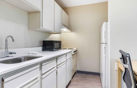 Studio, 1 Queen Bed, Non Smoking | Private kitchen | Full-size fridge, microwave, stovetop, coffee/tea maker
