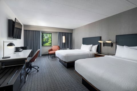 Premium bedding, memory foam beds, in-room safe, desk