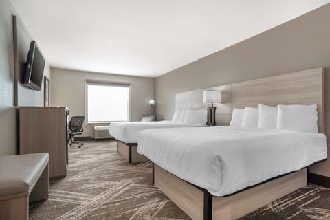 Premium bedding, Tempur-Pedic beds, desk, blackout drapes