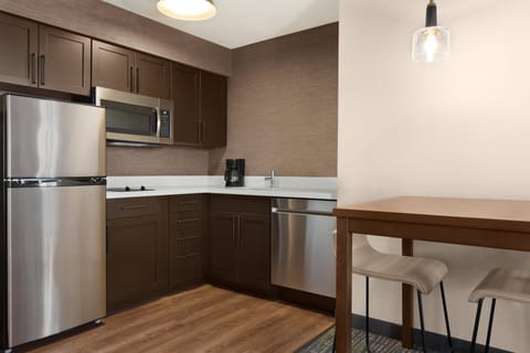 Suite, 1 Bedroom, Non Smoking | Private kitchen | Full-size fridge, microwave, stovetop, dishwasher