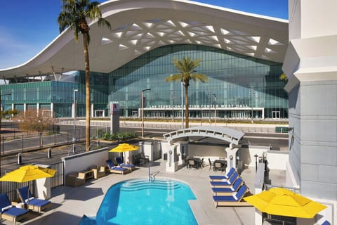 Outdoor pool, open 7:00 AM to 11:00 PM, sun loungers
