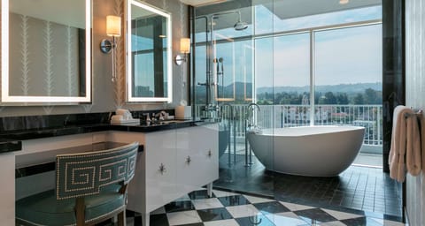 Presidential Suite | Bathroom | Designer toiletries, hair dryer, bathrobes, slippers