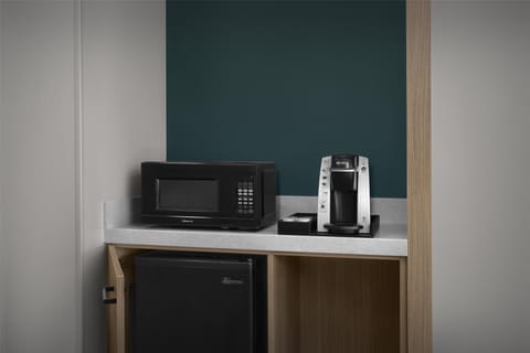 Desk, blackout drapes, iron/ironing board, free cribs/infant beds