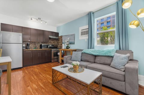 Standard Apartment, 1 Queen Bed with Sofa bed, Non Smoking (Suite Nine) | Living area | 65-inch flat-screen TV with satellite channels, TV