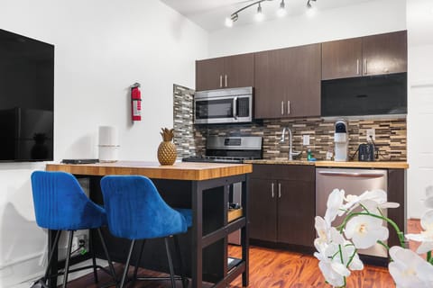 Standard Apartment, 1 Queen Bed with Sofa bed, Non Smoking (Suite Seven) | Private kitchen | Full-size fridge, microwave, oven, stovetop