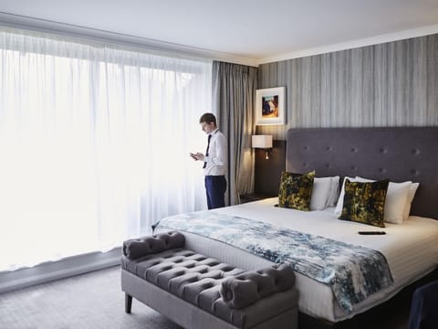 Junior Suite, 1 King Bed, Balcony | Premium bedding, in-room safe, desk, laptop workspace