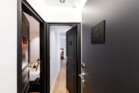 Family Room | Premium bedding, in-room safe, desk, laptop workspace