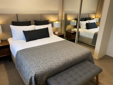 Executive Two Bedroom | Minibar, iron/ironing board, free WiFi, bed sheets