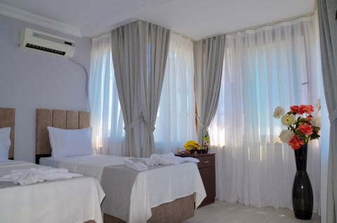 Standard Triple Room, 3 Bedrooms | Egyptian cotton sheets, Select Comfort beds, in-room safe