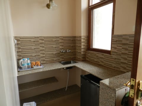 Luxury Double or Twin Room | Private kitchen | Electric kettle, highchair