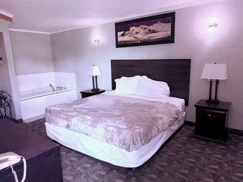 Honey Moon Suites | Pillowtop beds, desk, iron/ironing board, free WiFi