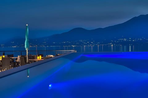 Indoor pool, seasonal outdoor pool, pool umbrellas, sun loungers