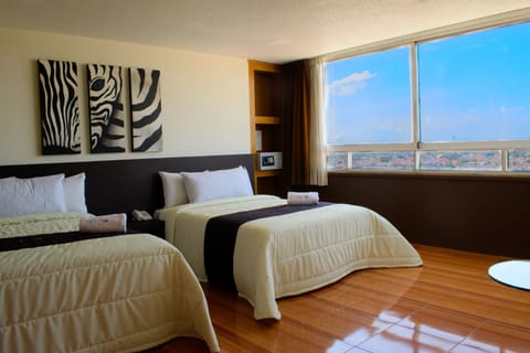 Family Room | Down comforters, in-room safe, iron/ironing board, free WiFi